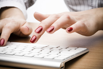 Fingers with red nail