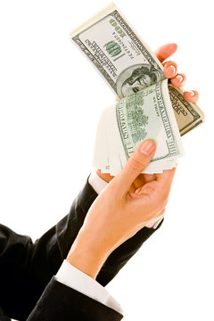 Image of businesswoman’s hands holding US dollars 