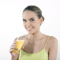 beautiful caucasian woman driking juice