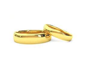 Wedding golden rings one over another. Isolated.