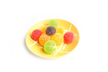 colored fruit candy on a plate