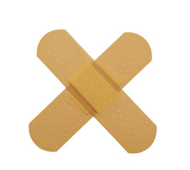 Crossed bandaid isolated over white