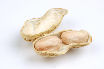 peeled peanut close up with white background