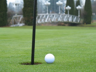 beside the hole