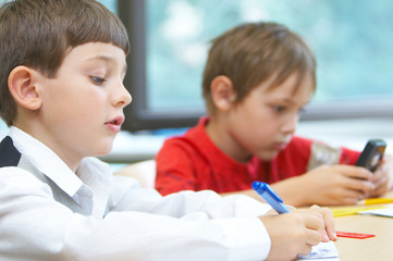 Obraz premium Pupils in a class. School change