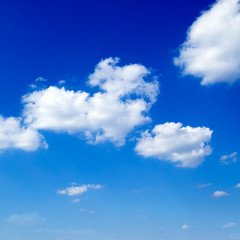Fototapeta premium white fluffy clouds in the blue sky.