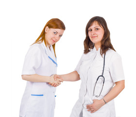 Fototapeta premium medicla team - a nurse and a doctor handshake