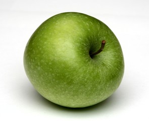 Green apple isolated against a white background