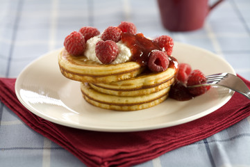 Delicious pancakes with ricotta and raspberries
