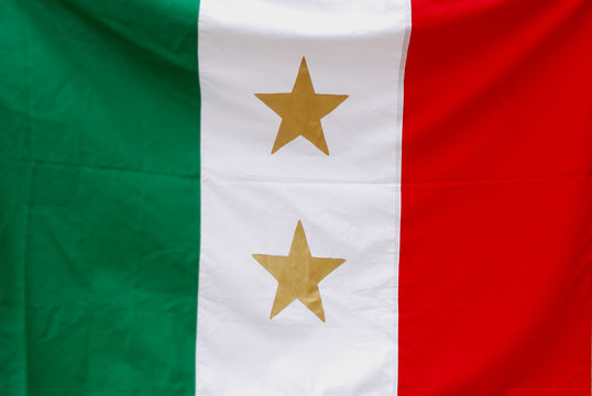 Mexican tricolor and two stars for states of Coahuila and Tejas.