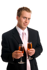 A handsome young man holding glasses of wine