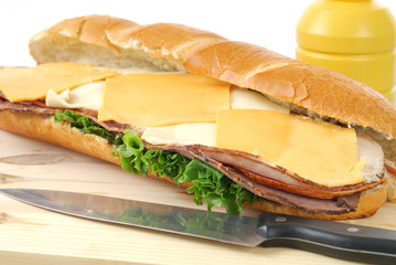 A giant submarine sandwich loaded with cold cuts