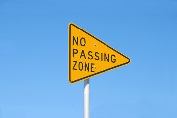 no passing zone sign
