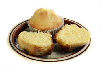 muffins on a plate isolated over a white background