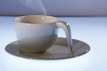 Tazzina di caffè fumante