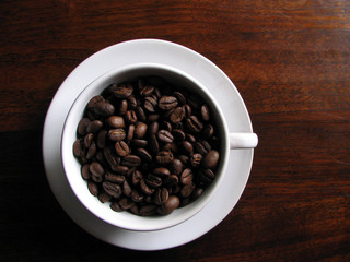 Coffee beans in white cup