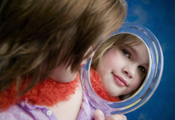 Little Girl Looking a Mirror © Scott Griessel