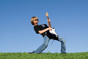 happy child, kid person tween playing guitar
