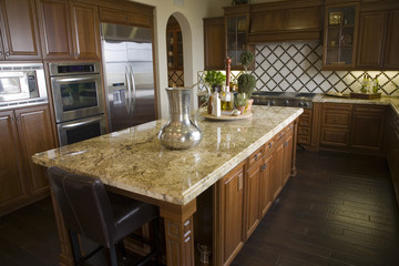 Luxury kitchen with a modern granite island.