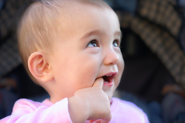 Cute Toddler looking up and smilling