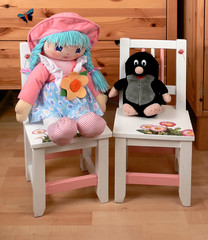 Chairs and baby dummies