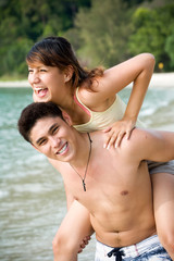 Fototapeta premium copule having fun on the beach