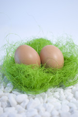 Eggs and green straw