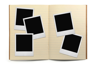 lined exercise book and photo frames