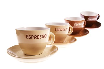 the row of coffee cups isolated on white