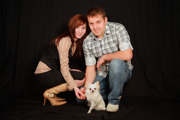 Obraz premium Couple with dog.