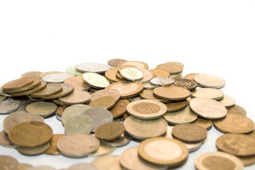 old antique metallic money on the white isolated background