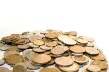 old antique metallic money on the white isolated background