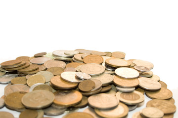 old antique metallic money on the white isolated background
