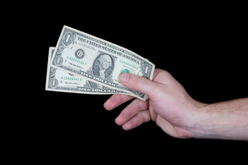Hand giving dollar banknotes