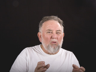 Older Man Describing Something