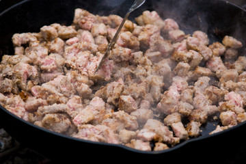 Frying Stew Meat In Iron Skillet