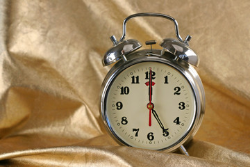 Metallic old-fashioned alarm-clock