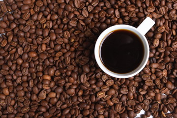 Cup with coffee, costing on coffee grain