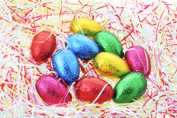 Obraz na płótnie Canvas Easter Eggs on Stuffing