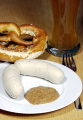 traditional bavarian white sausage and bretzel