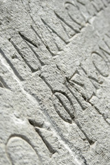 Roman writing in column in Roman Bath - Ankara, Turkey