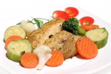 Healthy fish dish with various vegetables