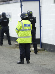 Uk Police Officers in Riot Gear