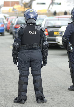 Uk Police Officers In Riot Gear