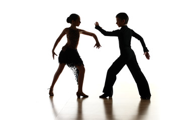 Young dancers in latin dance pose