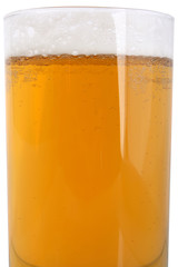 Glass of beer close-up with froth