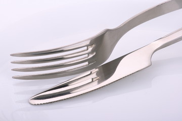 Knife and plug on a plate