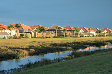 Tropical Florida housing tract with canal