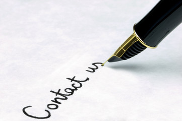 Contact Us written on watermarked paper by fountain pen