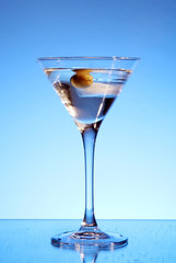 Martini glass with olive inside